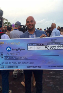 Ramiro Restrepo of Fasig-Tipton with the bonus check